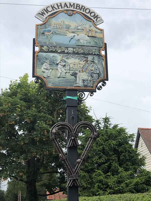 Fabricated willow heart which has been added to the Parish Sign